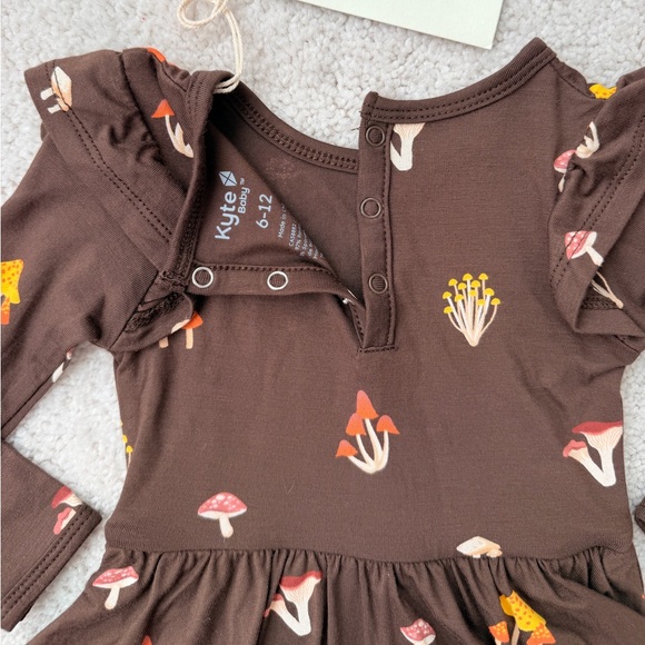 Kyte Baby Long Sleeve Twirl Bodysuit Dress in Brown Mushroom Print - Picture 11 of 12